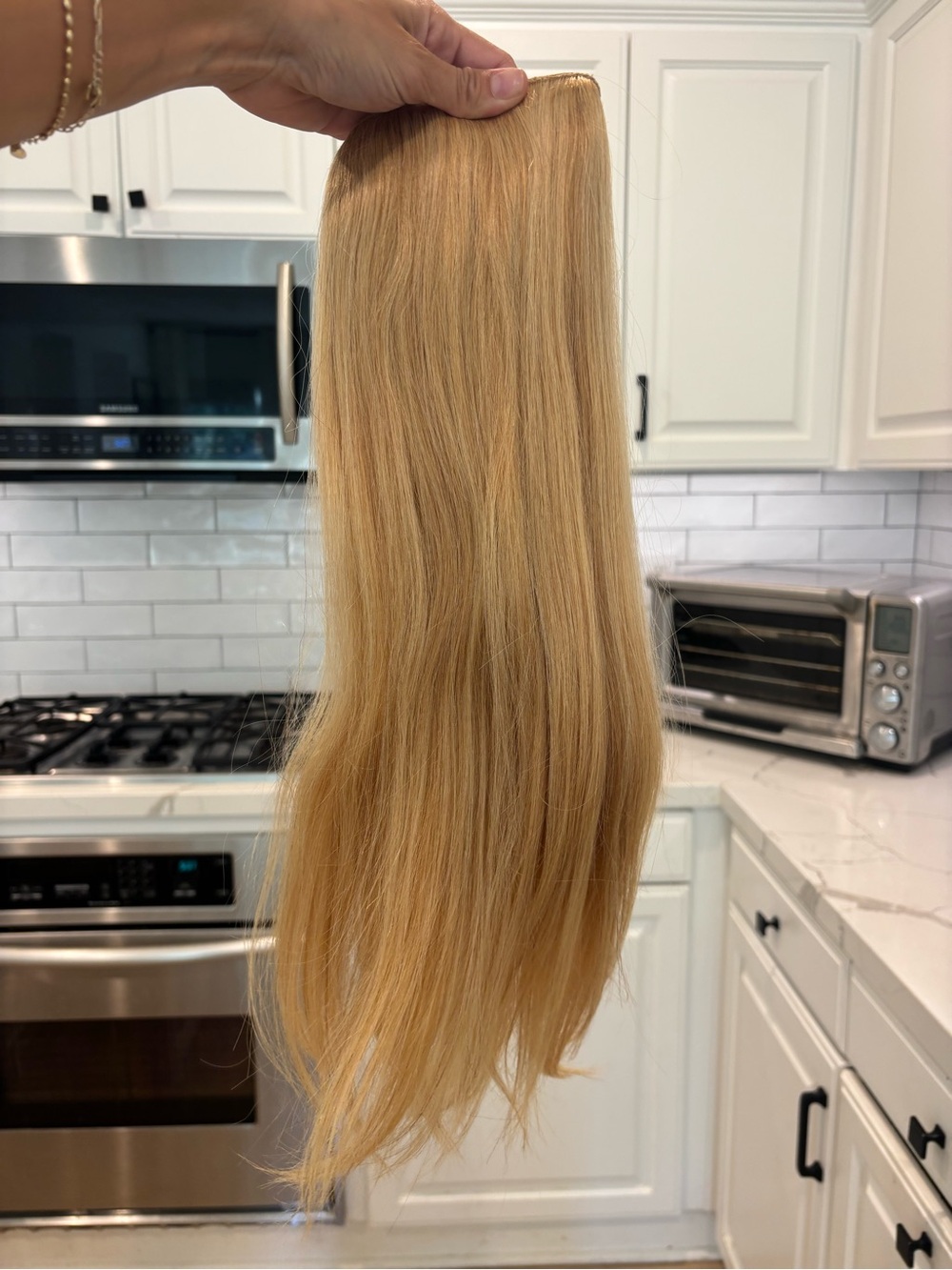 Halocouture 14-24 beautiful warm buttery light blonde.